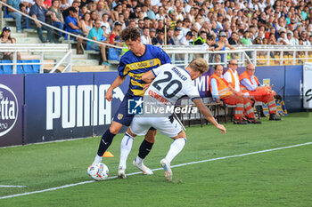 2024-08-04 - Mateusz Kowalski (Parma Calcio) fights for the ball against Mitchel Bakker (Atalanta BC) - PARMA CALCIO VS ATALANTA BC - FRIENDLY MATCH - SOCCER