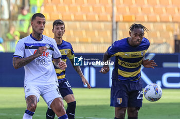 2024-08-04 - Wylan Cyprien (Parma Calcio) and Gianluca Scamacca (Atalanta BC battle for the ball - PARMA CALCIO VS ATALANTA BC - FRIENDLY MATCH - SOCCER