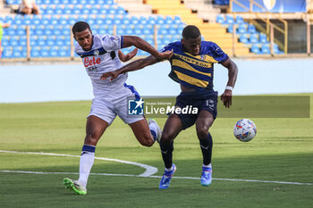 2024-08-04 - Ange-Yoan Bonny (Parma Calcio) and Isak Hien (Atalanta BC) fights for the ball - PARMA CALCIO VS ATALANTA BC - FRIENDLY MATCH - SOCCER