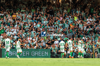 2024-08-03 - Real Betis players celebrating a goal during the Friendly football match between Real Betis and Al Ittihad on 3 August 2024 at Benito Villamarín stadium in Sevilla, Spain - FOOTBALL - FRIENDLY GAME - REAL BETIS V AL ITTIHAD - FRIENDLY MATCH - SOCCER