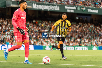 2024-08-03 - Karim Benzema from Al Ittihad and Rui Silva from Real Betis during the Friendly football match between Real Betis and Al Ittihad on 3 August 2024 at Benito Villamarín stadium in Sevilla, Spain - FOOTBALL - FRIENDLY GAME - REAL BETIS V AL ITTIHAD - FRIENDLY MATCH - SOCCER