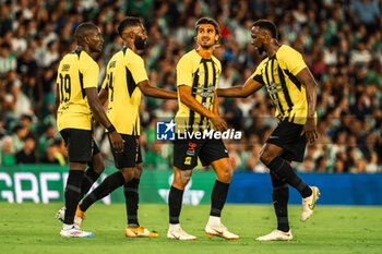 2024-08-03 - Moussa Diaby from Al Ittihad celebrating his goal with his teammates during the Friendly football match between Real Betis and Al Ittihad on 3 August 2024 at Benito Villamarín stadium in Sevilla, Spain - FOOTBALL - FRIENDLY GAME - REAL BETIS V AL ITTIHAD - FRIENDLY MATCH - SOCCER