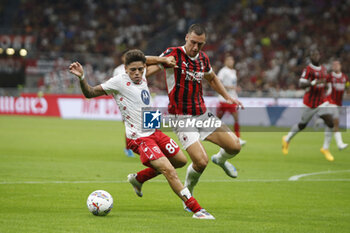 2024-08-13 - Samuele Vignato of AC Monza battle for the ball with Filippo Terracciano of AC Milan during AC Milan vs AC Monza , 2° edition of 