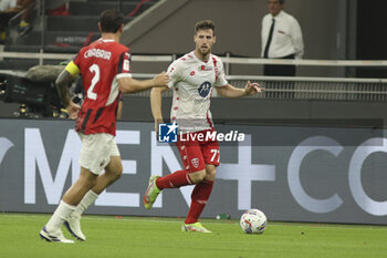 2024-08-13 - Georgios Kyriakopoulos of AC Monza play the ball during AC Milan vs AC Monza , 2° edition of 