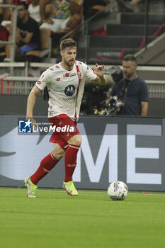 2024-08-13 - Georgios Kyriakopoulos of AC Monza play the ball during AC Milan vs AC Monza , 2° edition of 