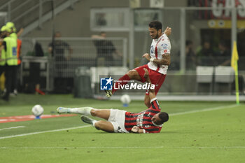 2024-08-13 - Filippo Terracciano of AC Milan battle for the ball with Pedro Pereira of AC Monza during AC Milan vs AC Monza , 2° edition of 