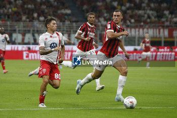 2024-08-13 - Samuele Vignato of AC Monza battle for the ball with Filippo Terracciano of AC Milan during AC Milan vs AC Monza , 2° edition of 