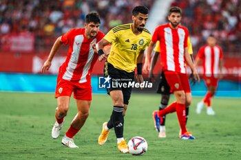 2024-08-08 - Ali Lajami of Al Nassr and Gonzalo Melero of UD Almeria during the Friendly football match between UD Almeria and Al-Nassr on 8 August 2024 at Power Horse Stadium in Almeria, Spain - FOOTBALL - FRIENDLY GAME - ALMERIA V AL NASSR - FRIENDLY MATCH - SOCCER