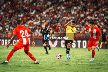 2024-08-08 - Abdulrahman Ghareeb of Al Nassr and Kaiky Fernandes Melo of UD Almeria during the Friendly football match between UD Almeria and Al-Nassr on 8 August 2024 at Power Horse Stadium in Almeria, Spain - FOOTBALL - FRIENDLY GAME - ALMERIA V AL NASSR - FRIENDLY MATCH - SOCCER