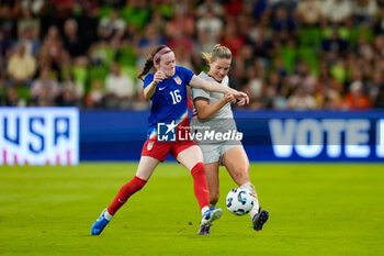 2024-10-24 - United States midfielder Rose Lavelle (16) collides with Iceland midfielder Hildur Antonsdottir (16) - USA WOMEN VS ICELAND WOMEN - FRIENDLY MATCH - SOCCER