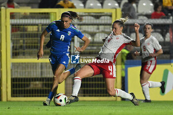 2024-10-25 - Agnese Bonfantini (ITA) and Emma Lipman (MLT) in action during the women's international friendly match between Italy and Malta FA at the Tre Fontane Stadium on October 25, 2024 in Rome, Italy. - ITALY WOMEN VS MALTA WOMEN - FRIENDLY MATCH - SOCCER