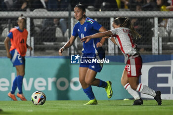 2024-10-25 - Eva Schatzer (ITA) and Emma Xuereb (MLT) in action during the women's international friendly match between Italy and Malta FA at the Tre Fontane Stadium on October 25, 2024 in Rome, Italy. - ITALY WOMEN VS MALTA WOMEN - FRIENDLY MATCH - SOCCER