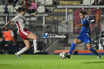 2024-10-25 - Nicole Sciberras (MLT) and Angelica Soffia (ITA) in action during the women's international friendly match between Italy and Malta FA at the Tre Fontane Stadium on October 25, 2024 in Rome, Italy. - ITALY WOMEN VS MALTA WOMEN - FRIENDLY MATCH - SOCCER