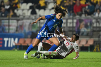 2024-10-25 - Eva Schatzer (ITA) and Brenda Borg (MLT) in action during the women's international friendly match between Italy and Malta FA at the Tre Fontane Stadium on October 25, 2024 in Rome, Italy. - ITALY WOMEN VS MALTA WOMEN - FRIENDLY MATCH - SOCCER