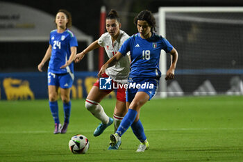 2024-10-25 - Eva Schatzer (ITA) and Kailey Willis (MLT) in action during the women's international friendly match between Italy and Malta FA at the Tre Fontane Stadium on October 25, 2024 in Rome, Italy. - ITALY WOMEN VS MALTA WOMEN - FRIENDLY MATCH - SOCCER