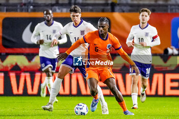 2024-11-18 - Ezechiel Banzuzi of Netherlands and Lewis Miley of England during the U21 International Friendly football match between Netherlands and England on November 18, 2024 at Yanmar Stadion in Almere, Netherlands - FOOTBALL - UNDER 21 FRIENDLY GAME - NETHERLANDS V ENGLAND - FRIENDLY MATCH - SOCCER