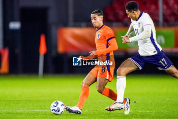 2024-11-18 - Anass Salah-Eddine of Netherlands and Jobe Bellingham of England during the U21 International Friendly football match between Netherlands and England on November 18, 2024 at Yanmar Stadion in Almere, Netherlands - FOOTBALL - UNDER 21 FRIENDLY GAME - NETHERLANDS V ENGLAND - FRIENDLY MATCH - SOCCER