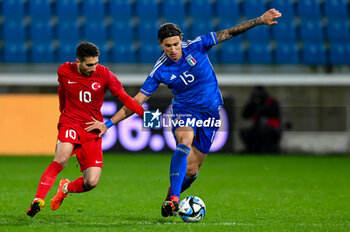 2024-03-26 - Italy’s Riccardo Calafiori portrait in action - EURO 2025 U21 - QUALIFYING - ITALY VS TURKEY - UEFA EUROPEAN - SOCCER