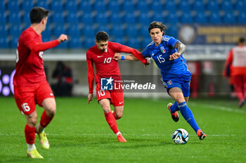 2024-03-26 - Italy’s Riccardo Calafiori portrait in action - EURO 2025 U21 - QUALIFYING - ITALY VS TURKEY - UEFA EUROPEAN - SOCCER