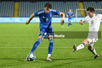 2024-03-22 - Giovanni Fabbian (Italy) shooting on goal - EURO 2025 U21 - QUALIFYING - ITALY V LATVIA - UEFA EUROPEAN - SOCCER