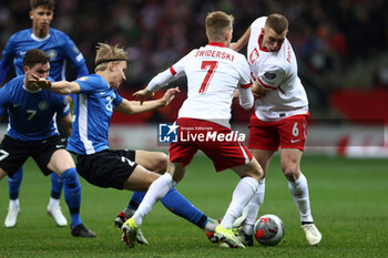 2024-02-25 - Karol Swiderski and Jakub Piotrowski of Poland during the UEFA Euro 2024, Play-off football match between Poland and Estonia on March 21, 2024 at PGE Narodowy stadium in Warsaw, Poland - FOOTBALL - EURO 2024 - PLAY OFF - POLAND V ESTONIA - UEFA EUROPEAN - SOCCER
