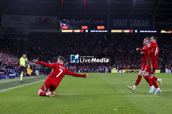 2024-03-21 - David Brooks (7) of Wales celebrates his goal 1-0 during the UEFA Euro 2024, Play-off football match between Wales and Finland on 21 March 2024 at Cardiff City Stadium in Cardiff, Wales - FOOTBALL - EURO 2024 - PLAY OFF - WALES V FINLAND - UEFA EUROPEAN - SOCCER