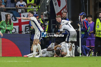 2024-06-30 - England forward Harry Kane scores a goal 2-1 and celebrates during the UEFA Euro 2024, Round of 16 football match between England and Slovakia on 30 June 2024 at Veltins-Arena in Gelsenkirchen, Germany - FOOTBALL - EURO 2024 - 1/8 - ENGLAND V SLOVAKIA - UEFA EUROPEAN - SOCCER