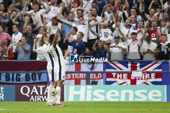 2024-06-30 - England midfielder Jude Bellingham scores a goal 1-1 and celebrates with England forward Harry Kane during the UEFA Euro 2024, Round of 16 football match between England and Slovakia on 30 June 2024 at Veltins-Arena in Gelsenkirchen, Germany - FOOTBALL - EURO 2024 - 1/8 - ENGLAND V SLOVAKIA - UEFA EUROPEAN - SOCCER