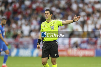 2024-06-30 - Referee Umut Meler during the UEFA Euro 2024, Round of 16 football match between England and Slovakia on 30 June 2024 at Veltins-Arena in Gelsenkirchen, Germany - FOOTBALL - EURO 2024 - 1/8 - ENGLAND V SLOVAKIA - UEFA EUROPEAN - SOCCER