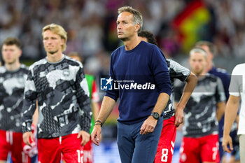 2024-06-29 - Kasper Hjulmand head coach of Denmark looks dejected at full time during the UEFA Euro 2024, Round of 16 football match between Germany and Denmark on 29 June 2024 at Signal Iduna Park in Dortmund, Germany - FOOTBALL - EURO 2024 - 1/8 - GERMANY V DENMARK - UEFA EUROPEAN - SOCCER