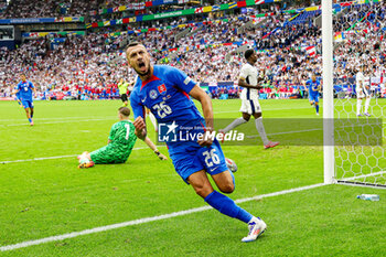 2024-07-01 - Ivan Schranz of Slovakia scores a goal 0-1 and celebrates during the UEFA Euro 2024, Round of 16 football match between England and Slovakia on 30 June 2024 at Veltins-Arena in Gelsenkirchen, Germany - FOOTBALL - EURO 2024 - 1/8 - ENGLAND V SLOVAKIA - UEFA EUROPEAN - SOCCER