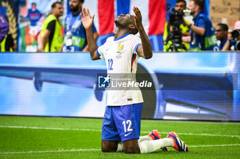 2024-07-01 - Randal KOLO MUANI of France celebrates his goal during the UEFA Euro 2024, Round of 16 football match between France and Belgium on 1 July 2024 at Merkur Spiel-Arena in Dusseldorf, Germany - FOOTBALL - EURO 2024 - 1/8 - FRANCE V BELGIUM - UEFA EUROPEAN - SOCCER