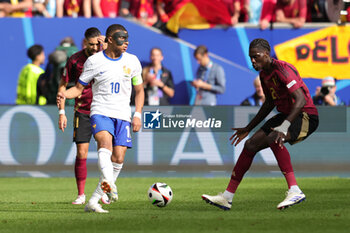 2024-07-01 - Kylian Mbappe of France and Amadou Onana of Belgium during the UEFA Euro 2024, Round of 16 football match between France and Belgium on 1 July 2024 at Merkur Spiel-Arena in Dusseldorf, Germany - FOOTBALL - EURO 2024 - 1/8 - FRANCE V BELGIUM - UEFA EUROPEAN - SOCCER