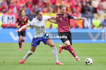 2024-07-01 - Adrien Rabiot of France and Kevin De Bruyne of Belgium during the UEFA Euro 2024, Round of 16 football match between France and Belgium on 1 July 2024 at Merkur Spiel-Arena in Dusseldorf, Germany - FOOTBALL - EURO 2024 - 1/8 - FRANCE V BELGIUM - UEFA EUROPEAN - SOCCER