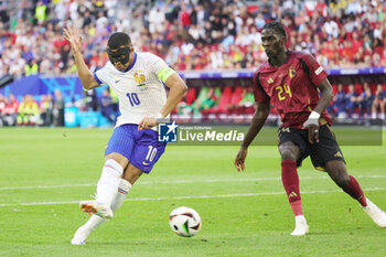 2024-07-01 - Kylian Mbappe of France and Amadou Onana of Belgium during the UEFA Euro 2024, Round of 16 football match between France and Belgium on 1 July 2024 at Merkur Spiel-Arena in Dusseldorf, Germany - FOOTBALL - EURO 2024 - 1/8 - FRANCE V BELGIUM - UEFA EUROPEAN - SOCCER