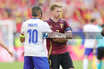 2024-07-01 - Kylian Mbappe of France and Kevin De Bruyne of Belgium at full time during the UEFA Euro 2024, Round of 16 football match between France and Belgium on 1 July 2024 at Merkur Spiel-Arena in Dusseldorf, Germany - FOOTBALL - EURO 2024 - 1/8 - FRANCE V BELGIUM - UEFA EUROPEAN - SOCCER