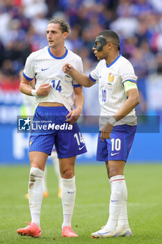 2024-07-01 - Adrien Rabiot and Kylian Mbappe of France during the UEFA Euro 2024, Round of 16 football match between France and Belgium on 1 July 2024 at Merkur Spiel-Arena in Dusseldorf, Germany - FOOTBALL - EURO 2024 - 1/8 - FRANCE V BELGIUM - UEFA EUROPEAN - SOCCER