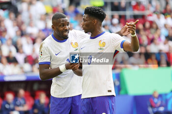 2024-07-01 - Marcus Thuram and Aurelien Tchouameni of France during the UEFA Euro 2024, Round of 16 football match between France and Belgium on 1 July 2024 at Merkur Spiel-Arena in Dusseldorf, Germany - FOOTBALL - EURO 2024 - 1/8 - FRANCE V BELGIUM - UEFA EUROPEAN - SOCCER