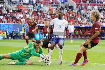 2024-07-01 - Marcus Thuram of France and Goalkeeper Koen Casteels of Belgium during the UEFA Euro 2024, Round of 16 football match between France and Belgium on 1 July 2024 at Merkur Spiel-Arena in Dusseldorf, Germany - FOOTBALL - EURO 2024 - 1/8 - FRANCE V BELGIUM - UEFA EUROPEAN - SOCCER