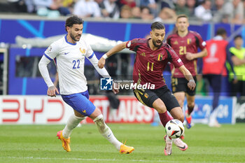 2024-07-01 - Theo Hernandez of France and Yannick Carrasco of Belgium during the UEFA Euro 2024, Round of 16 football match between France and Belgium on 1 July 2024 at Merkur Spiel-Arena in Dusseldorf, Germany - FOOTBALL - EURO 2024 - 1/8 - FRANCE V BELGIUM - UEFA EUROPEAN - SOCCER