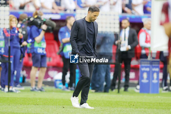 2024-07-01 - Head Coach Domenico Tedesco of Belgium looks dejected at full time during the UEFA Euro 2024, Round of 16 football match between France and Belgium on 1 July 2024 at Merkur Spiel-Arena in Dusseldorf, Germany - FOOTBALL - EURO 2024 - 1/8 - FRANCE V BELGIUM - UEFA EUROPEAN - SOCCER