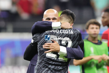 2024-07-01 - Goalkeeper Diogo Costa of Portugal celebrates with Head Coach Roberto Martinez after the penalty shoot-out during the UEFA Euro 2024, Round of 16 football match between Portugal and Slovenia on 1July 2024 at Deutsche Bank Park in Frankfurt, Germany - FOOTBALL - EURO 2024 - 1/8 - PORTUGAL V SLOVENIA - UEFA EUROPEAN - SOCCER