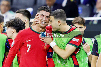 2024-07-01 - Cristiano Ronaldo of Portugal in tears before the penalty shoot-out during the UEFA Euro 2024, Round of 16 football match between Portugal and Slovenia on 1July 2024 at Deutsche Bank Park in Frankfurt, Germany - FOOTBALL - EURO 2024 - 1/8 - PORTUGAL V SLOVENIA - UEFA EUROPEAN - SOCCER