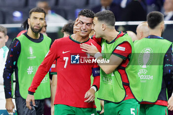 2024-07-01 - Cristiano Ronaldo of Portugal in tears before the penalty shoot-out during the UEFA Euro 2024, Round of 16 football match between Portugal and Slovenia on 1July 2024 at Deutsche Bank Park in Frankfurt, Germany - FOOTBALL - EURO 2024 - 1/8 - PORTUGAL V SLOVENIA - UEFA EUROPEAN - SOCCER