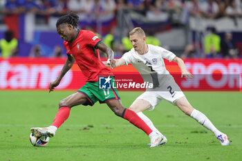 2024-07-01 - Rafael Leao of Portugal and Zan Karnicnik of Slovenia during the UEFA Euro 2024, Round of 16 football match between Portugal and Slovenia on 1July 2024 at Deutsche Bank Park in Frankfurt, Germany - FOOTBALL - EURO 2024 - 1/8 - PORTUGAL V SLOVENIA - UEFA EUROPEAN - SOCCER