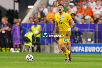 2024-07-02 - Andrei Burca of Romania during the UEFA Euro 2024, Round of 16 football match between Romania and Netherlands on July 2, 2024 at Allianz Arena in Munich, Germany - FOOTBALL - EURO 2024 - 1/8 - ROMANIA V NETHERLANDS - UEFA EUROPEAN - SOCCER