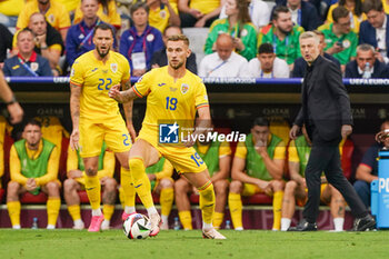 2024-07-02 - Denis Dragus of Romania during the UEFA Euro 2024, Round of 16 football match between Romania and Netherlands on July 2, 2024 at Allianz Arena in Munich, Germany - FOOTBALL - EURO 2024 - 1/8 - ROMANIA V NETHERLANDS - UEFA EUROPEAN - SOCCER