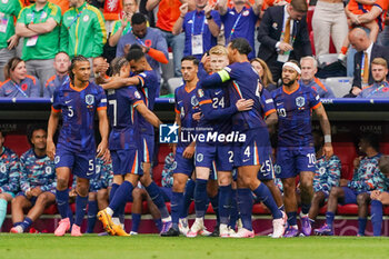 2024-07-02 - Cody Gakpo of Netherlands celebrates with his teammates after scoring his teams first goal during the UEFA Euro 2024, Round of 16 football match between Romania and Netherlands on July 2, 2024 at Allianz Arena in Munich, Germany - FOOTBALL - EURO 2024 - 1/8 - ROMANIA V NETHERLANDS - UEFA EUROPEAN - SOCCER