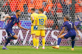 2024-07-02 - Cody Gakpo of Netherlands celebrates after scoring his teams first goal during the UEFA Euro 2024, Round of 16 football match between Romania and Netherlands on July 2, 2024 at Allianz Arena in Munich, Germany - FOOTBALL - EURO 2024 - 1/8 - ROMANIA V NETHERLANDS - UEFA EUROPEAN - SOCCER