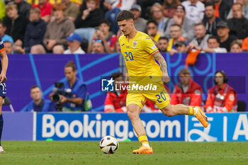 2024-07-02 - Dennis Man of Romania during the UEFA Euro 2024, Round of 16 football match between Romania and Netherlands on July 2, 2024 at Allianz Arena in Munich, Germany - FOOTBALL - EURO 2024 - 1/8 - ROMANIA V NETHERLANDS - UEFA EUROPEAN - SOCCER